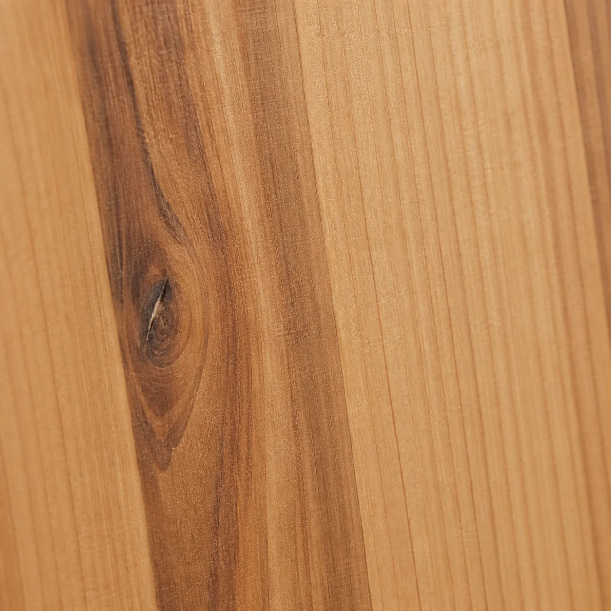 Ruvaro cedar wood grain with a natural knot